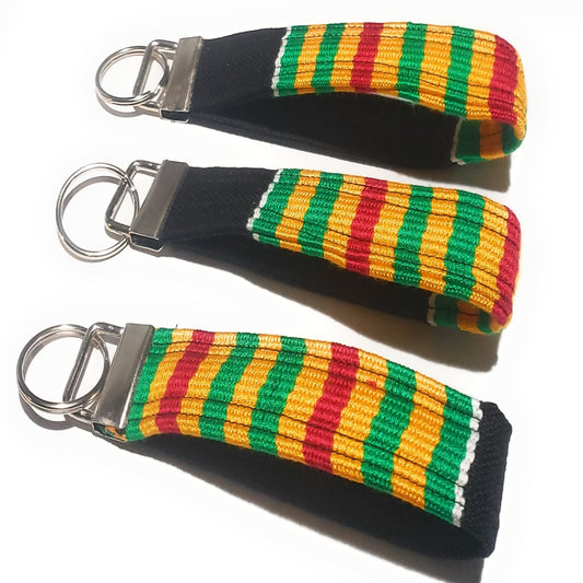 WRISTLET KEY CHAIN - BLACK GREEN GOLD RED